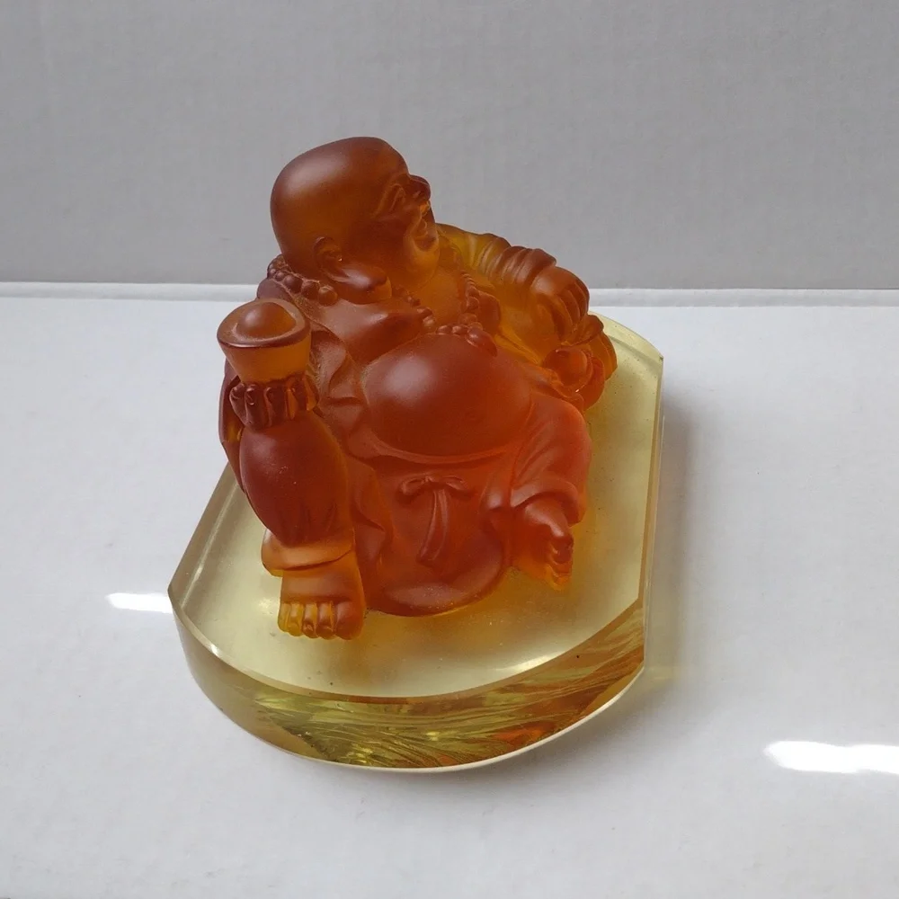 Orange Buddha Figurine